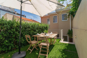 Apt with beautiful garden in the heart of the city